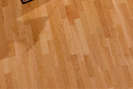 Przykładowe podłogi z drewna o barwie brązowej, wykonywane przez firmę Parkietnet1